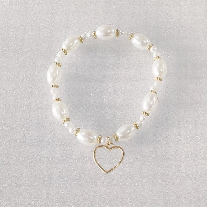 Endless - Armbånd med perler og hjerte anheng